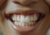 asian-man-with-slightly-crooked-teeth-considering-teeth-straightening-option-such-as-invlisagn-as-a-discreet-and-comfortable-method-to-align-teeth